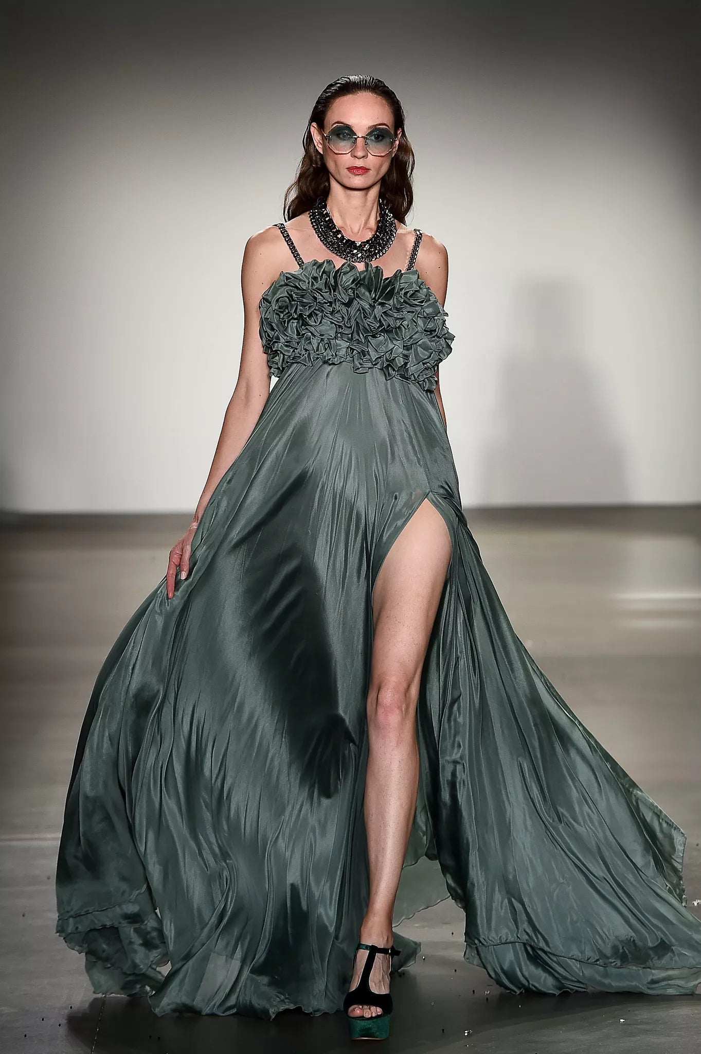Luxury evening gown by FRAQAIR featuring a fluid silhouette and refined Italian design